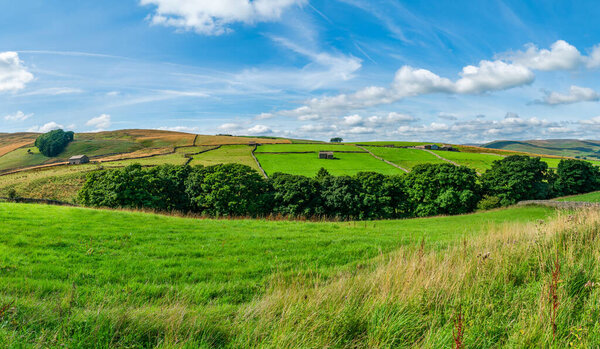 Wide panoramic view of beautiful rural landscape in Yorkshire Dales near Hawes, North Yorkshire, UK