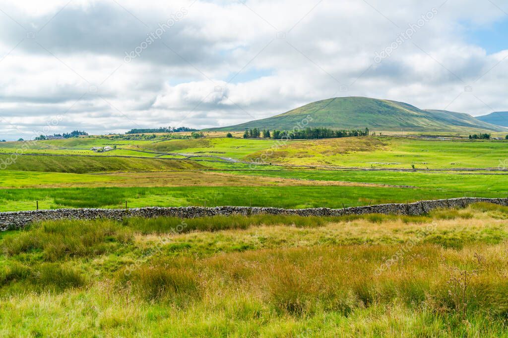 Wide panoramic view of beautiful rural landscape in Yorkshire Dales, North Yorkshire, UK