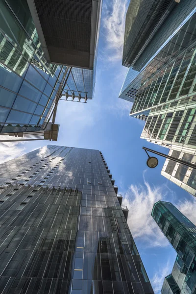 Modern skyscrapers in the City of London - upward view — Stock Photo, Image