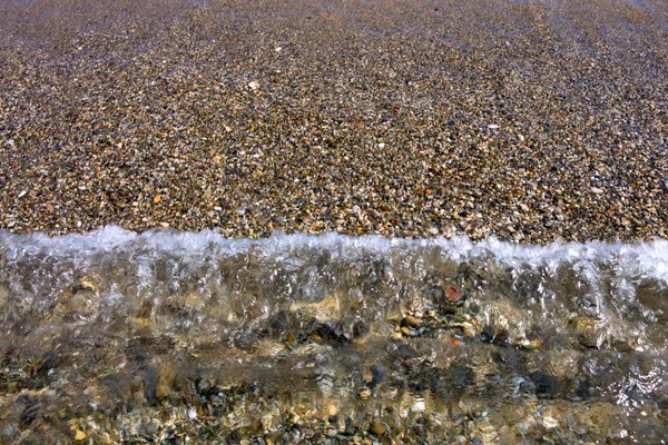 Meereswelle und Strand. — Stockfoto