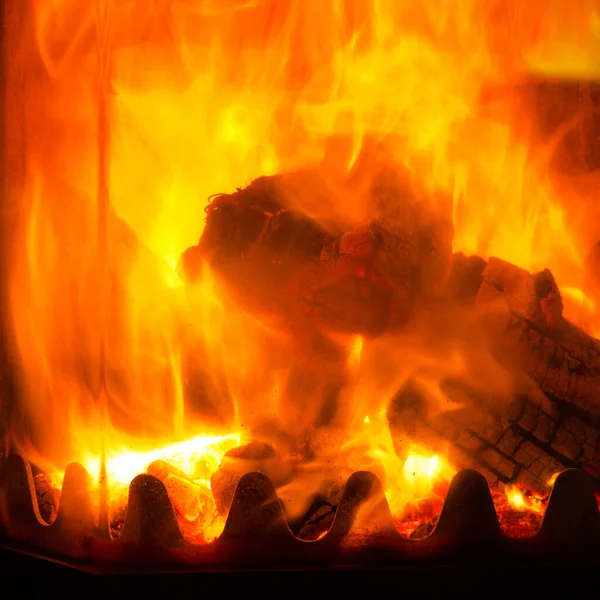 Api menyala di latar fireplace.Abstract. — Stok Foto