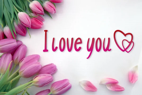 Pink tulips decoration and hearts on white background. Valentines Day card. — Stock Photo, Image