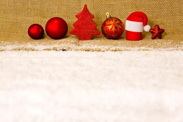 Red christmas decoration isolated and white snow . — Stock Photo, Image