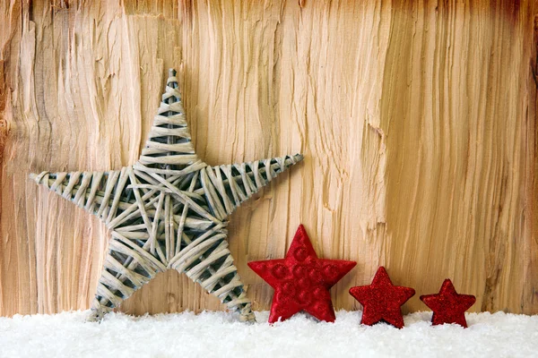 装飾的な星と雪とクリスマスの背景. — ストック写真