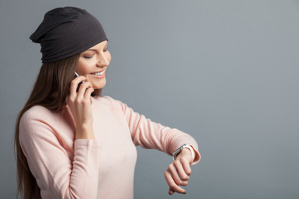 Beautiful young woman is communication on the telephone