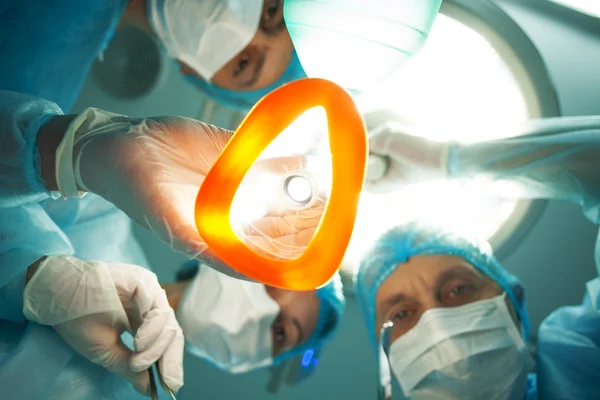 Skillful doctors are preparing person for operation — Stock Photo, Image