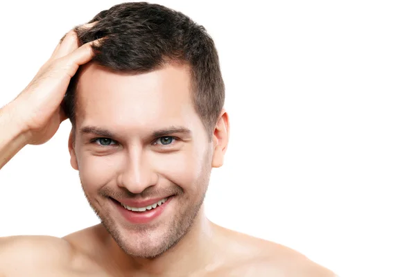 Cute guy is caring of his appearance — Stock Photo, Image