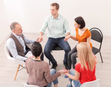 Young people on group therapy session