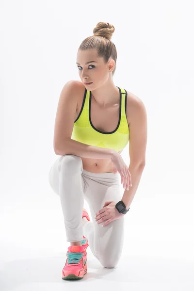Beautiful fit sportswoman is doing exercise — ストック写真