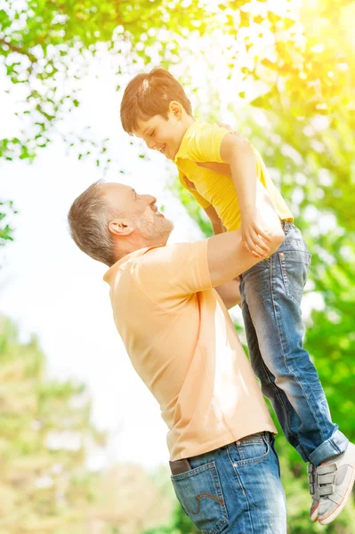Happy grandparent is playing with the child — Stock Photo, Image