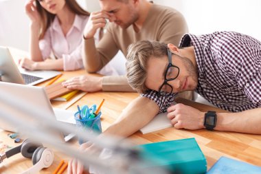 Young students studying for exams at home