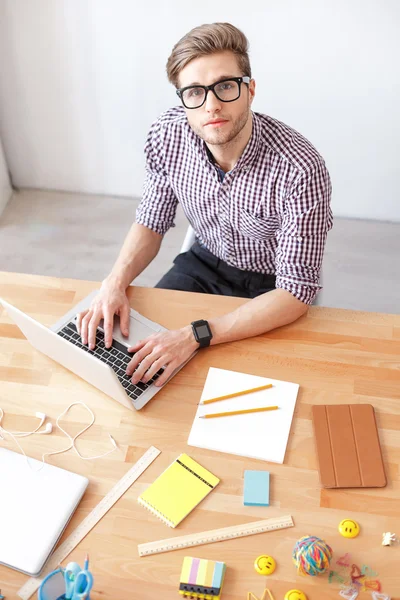 Young guy studying at home — Stock Photo, Image