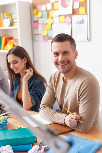 Young man studying for exams at home — Stockfoto