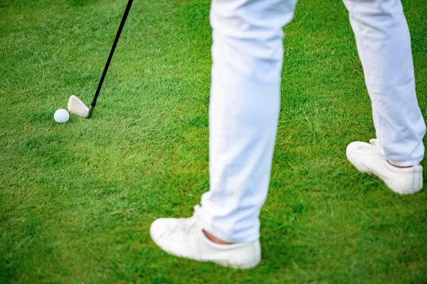 Jogador de golfe segurando clud — Fotografia de Stock