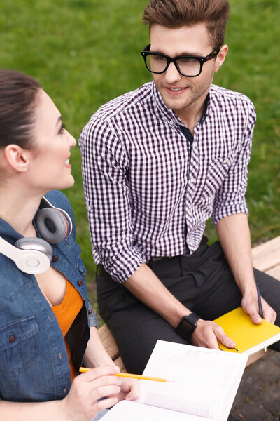 Cheerful young friends are spending time together