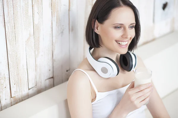 Beautiful woman with glass of milk — Stock Photo, Image