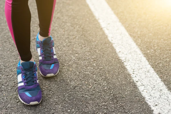 Fit jogger stands on pathway — Stock Photo, Image