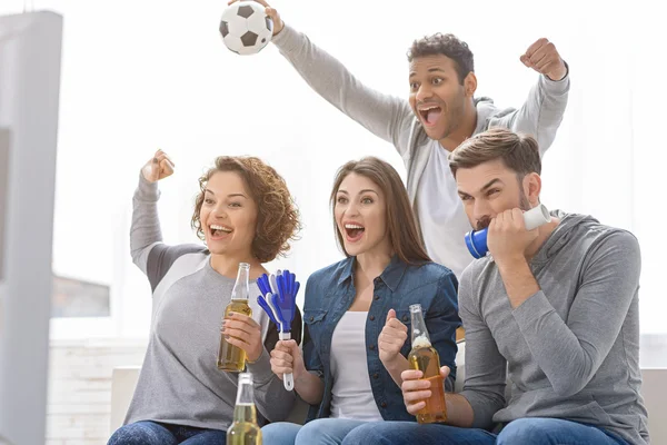 Fans of soccer watching match — Stock Photo, Image