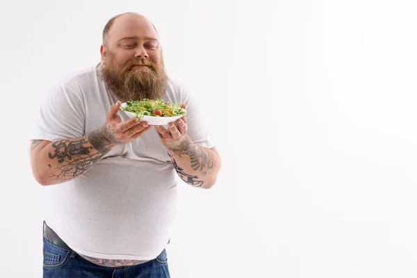 Joyful thick guy prefers healthy food — Stock Photo, Image