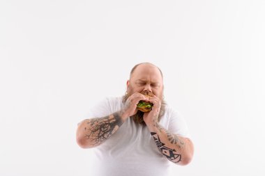 Kalın adam zevk sağlıksız hamburger