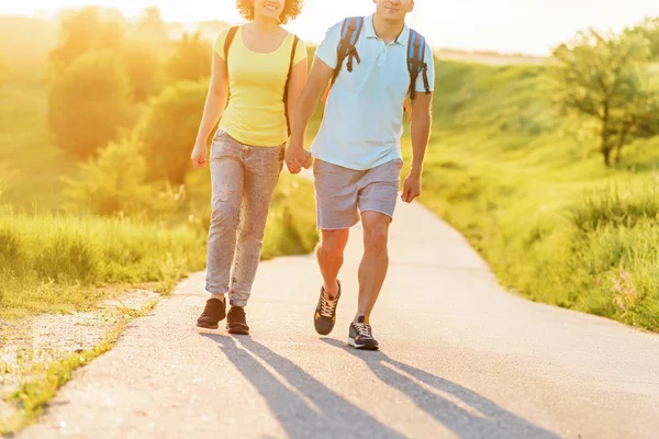 Young family hiking on mountain — Stock Photo, Image