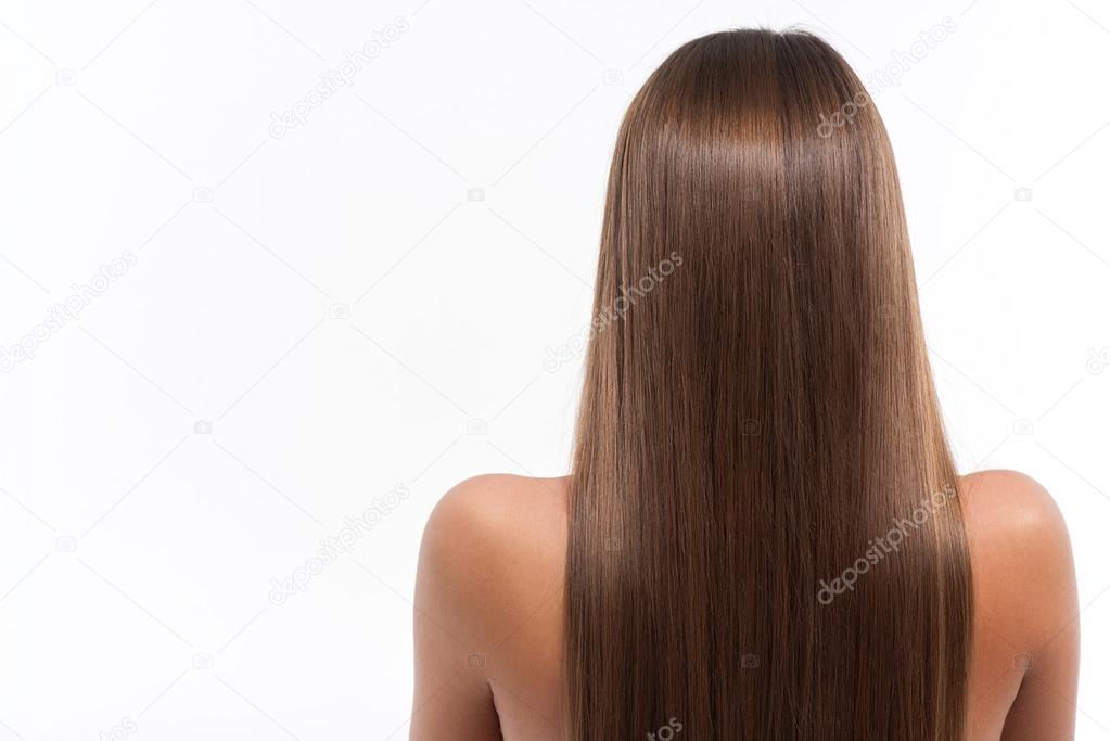 Girl showing her straight brown hair