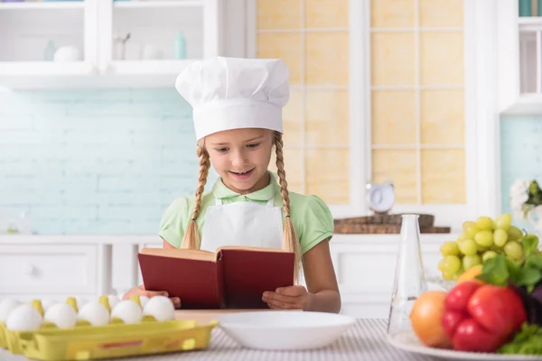 Joyful child is ready to cook — Stock Photo, Image