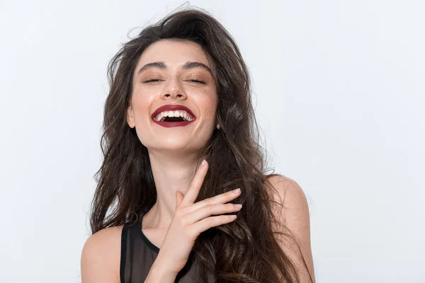 Portrait of a beautiful happy woman looking into camera — Stock Photo, Image