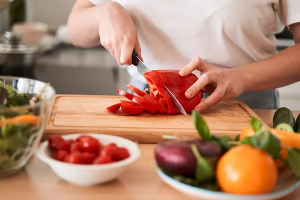 Woman is cooking natural healthy food — Stock Photo, Image