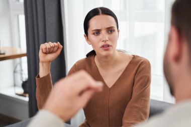 Woman communicating with her deaf dumb mute husband