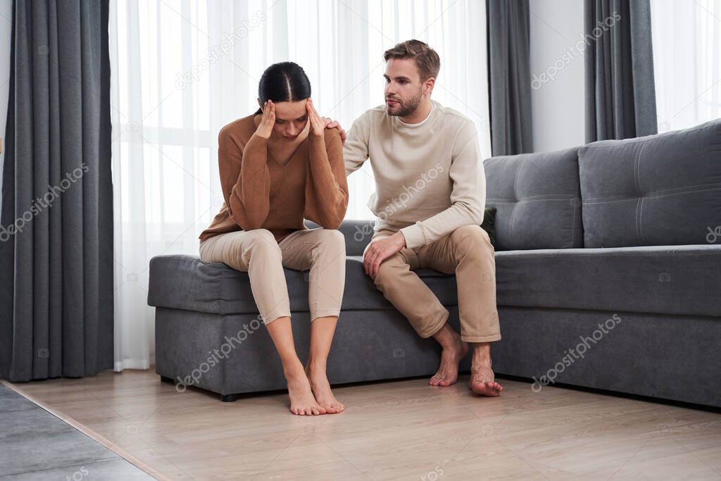 Couple quarreling at home