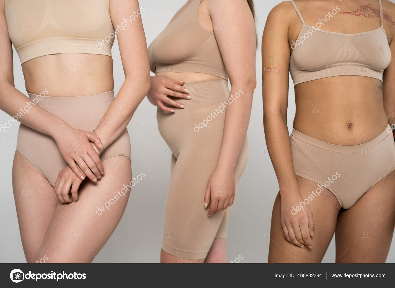Three girls with different bodies posing in underwear in front of