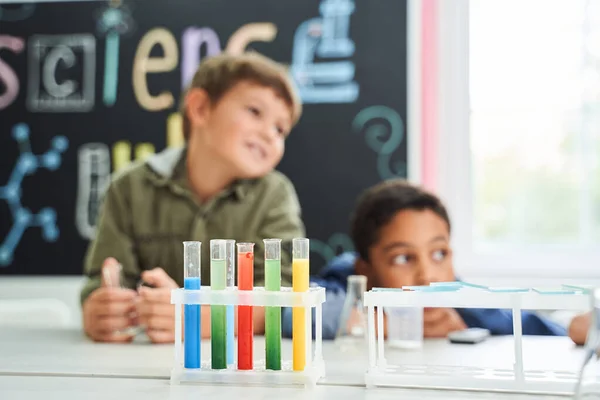 Close up view of the chemistry test tubes with colored liquids