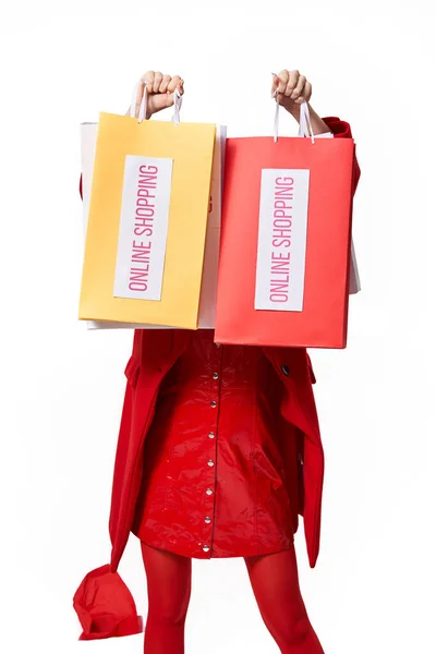 Woman holding bags with purchases after online shopping — Stock Photo, Image