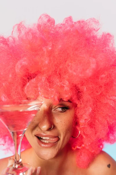 Woman sensitively showing her tongue while posing — Stock Photo, Image