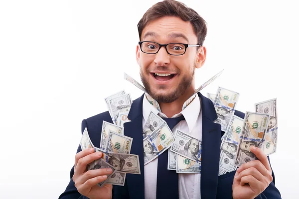 Attractive young man in suit and glasses with cash — Stockfoto