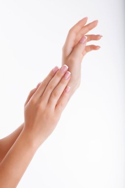 Beautiful human hands with cared manicured nails clipart