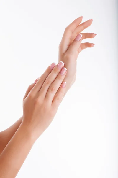 Beautiful human hands with cared manicured nails — Stockfoto