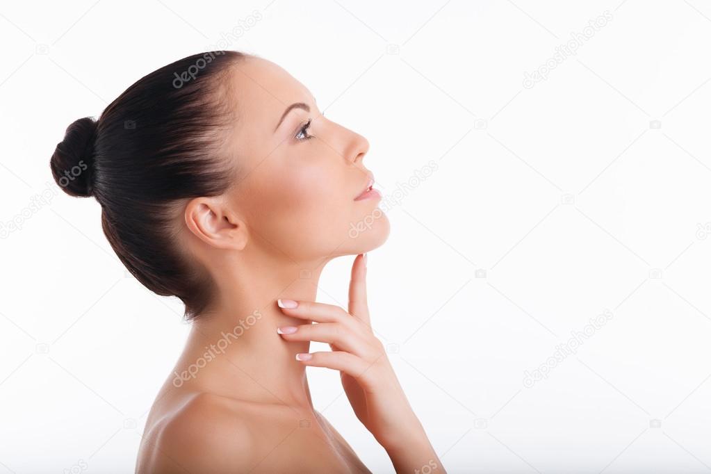 Attractive healthy girl is caring for her skin