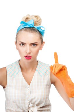 Cheerful young housewife is teaching how to clean