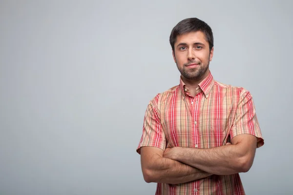 Handsome young man is expressing his shyness — Stock Photo, Image