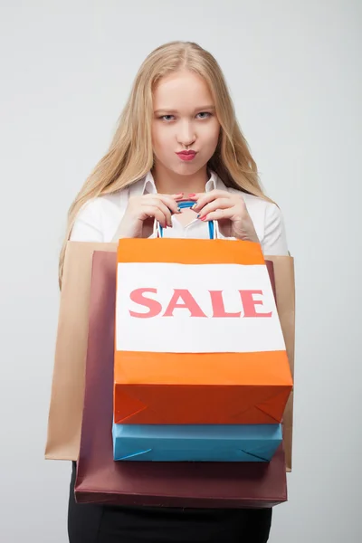 Attractive young girl is frustrated after shopping — Zdjęcie stockowe