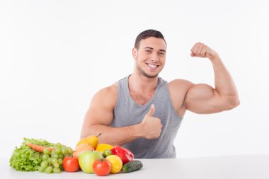 Handsome young man is proud of his healthy body
