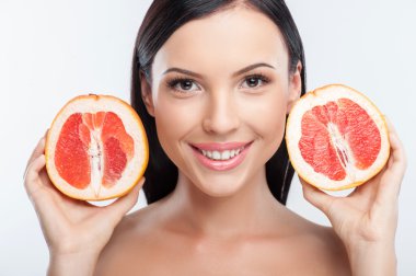 Attractive young woman is presenting right skin care