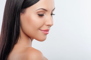 Attractive young woman is showing her healthy body