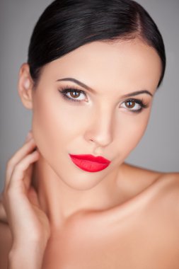 Attractive young healthy woman likes skin care