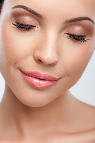 Cheerful young girl is caring of her skin — Stock Photo, Image