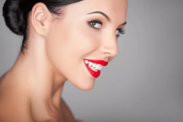 Cheerful young woman is caring of her skin — Stock Photo, Image