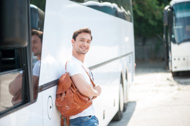 Attractive young guy is ready for his journey