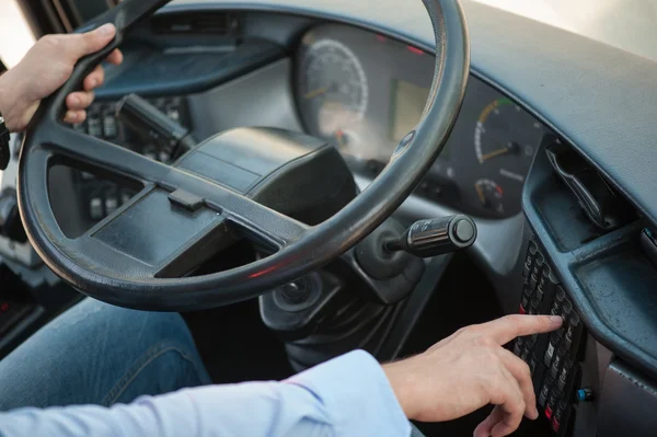 Young experienced driver is starting a public transport — Stock Photo, Image